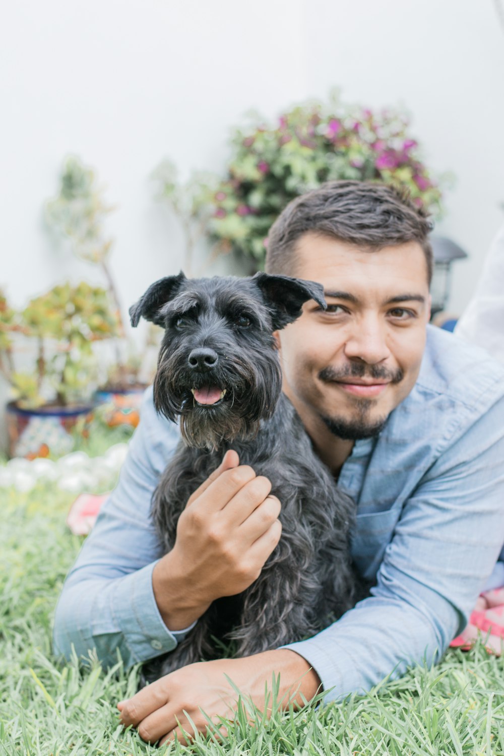 a person holding a dog