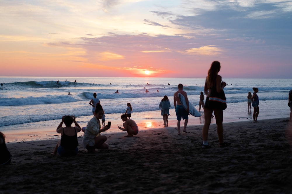 a group of people on a beach