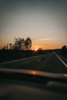 a road with trees on the side