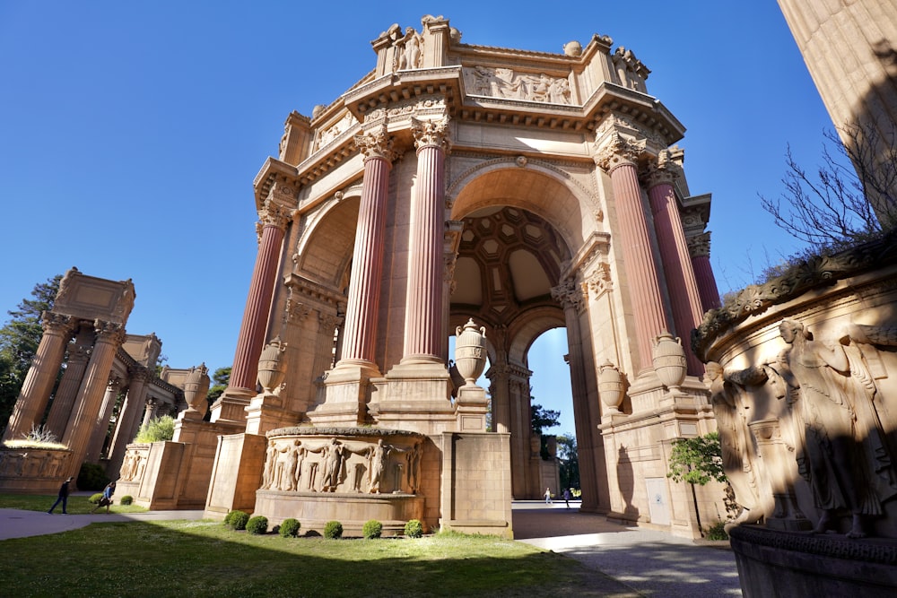 a large stone building with pillars