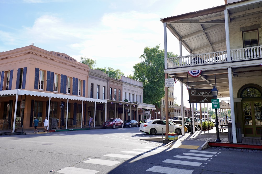 a street with cars and buildings along it