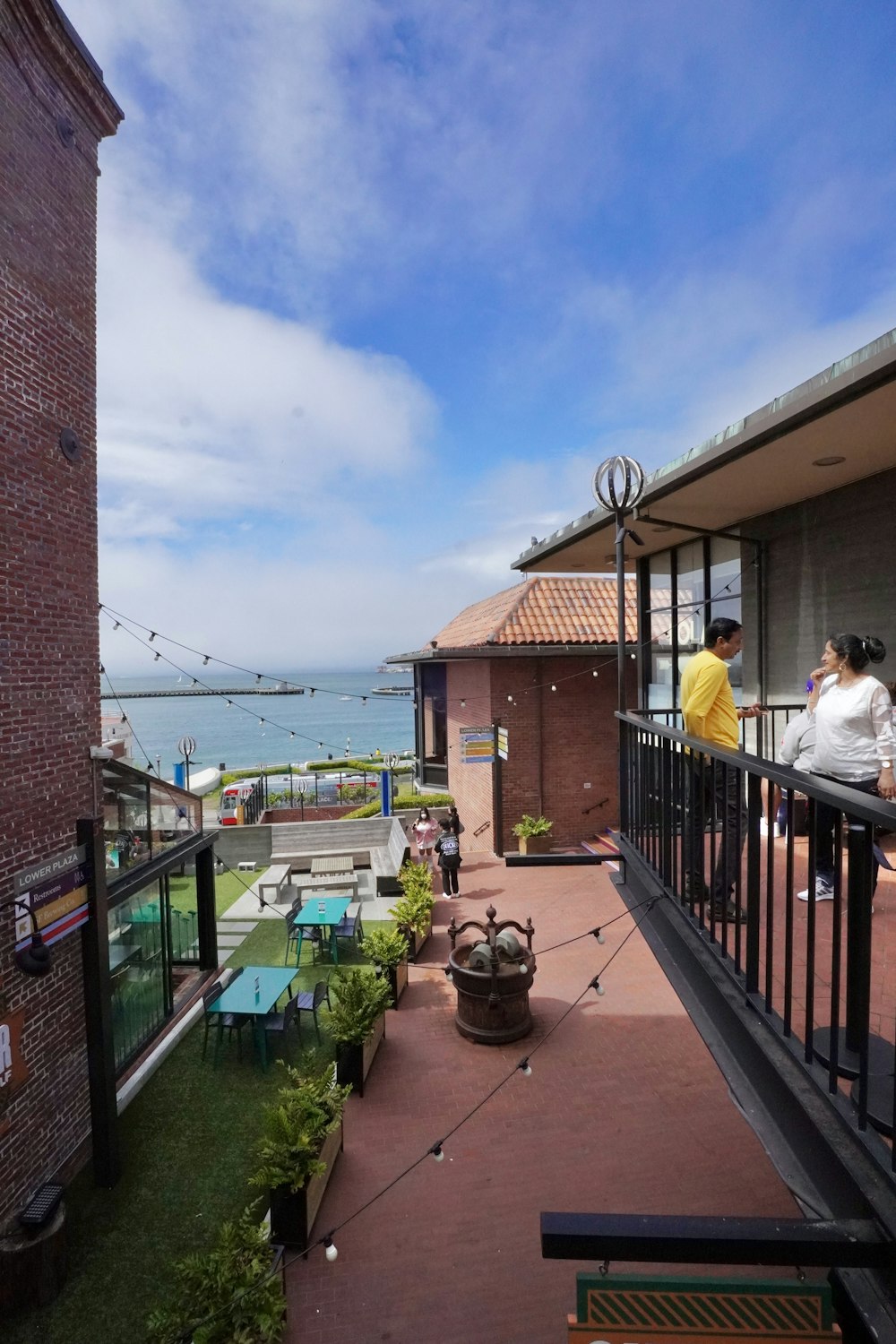 a group of people on a balcony