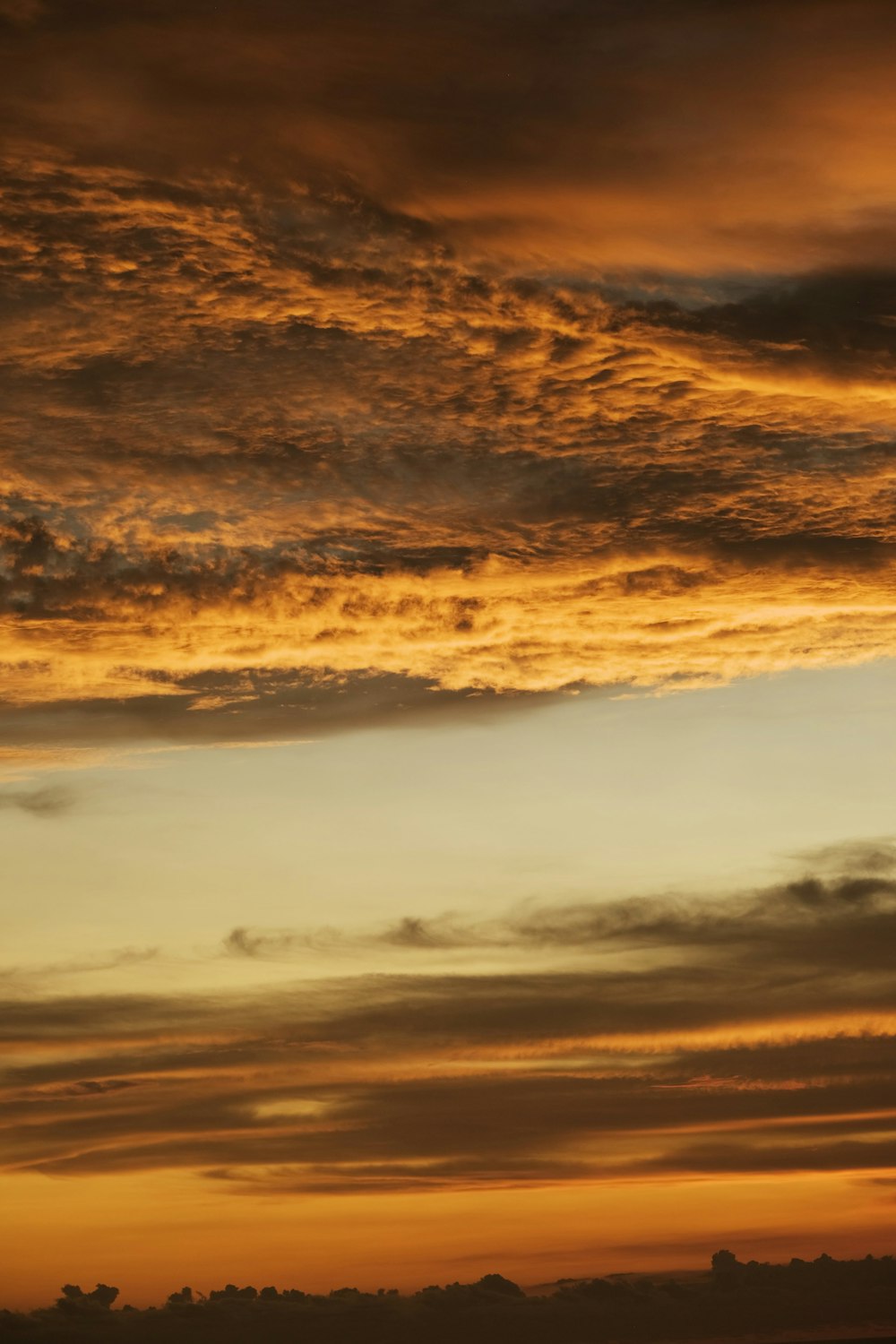 a sunset with clouds