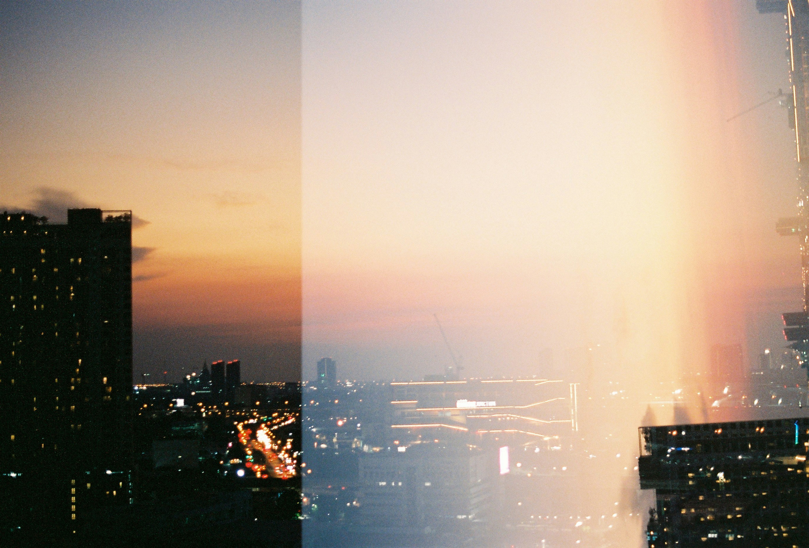 a city skyline at sunset