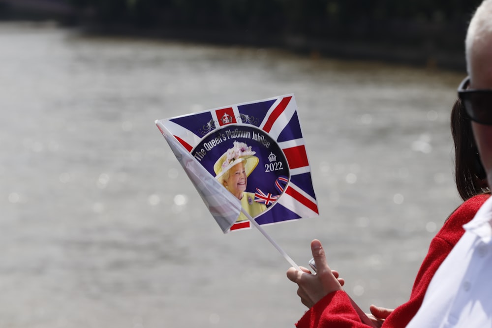 a person holding a flag