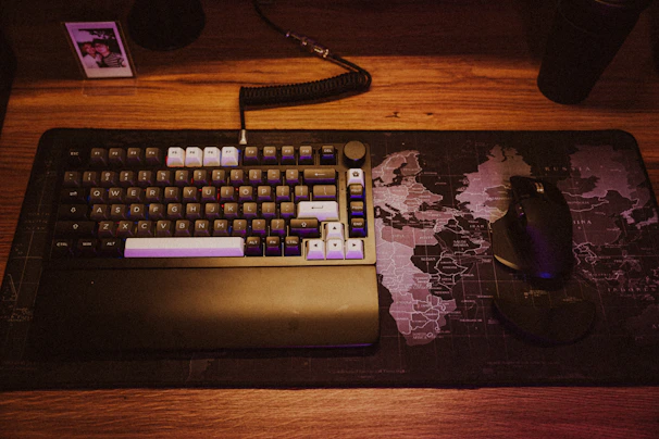 A sleek deskmat showcasing a detailed map from The Witcher universe with muted dark tones.