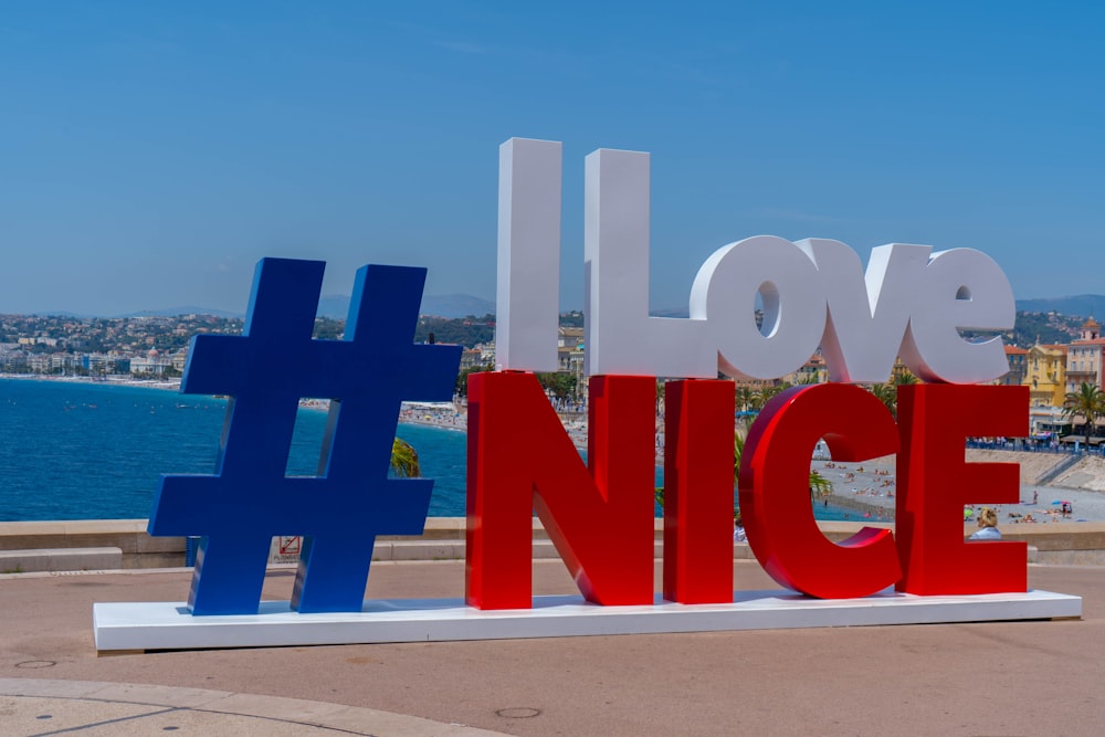 a group of red and white letters on a white surface