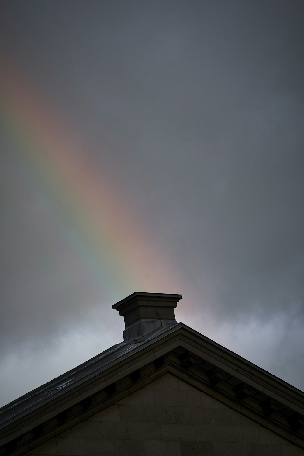 a rainbow over a building