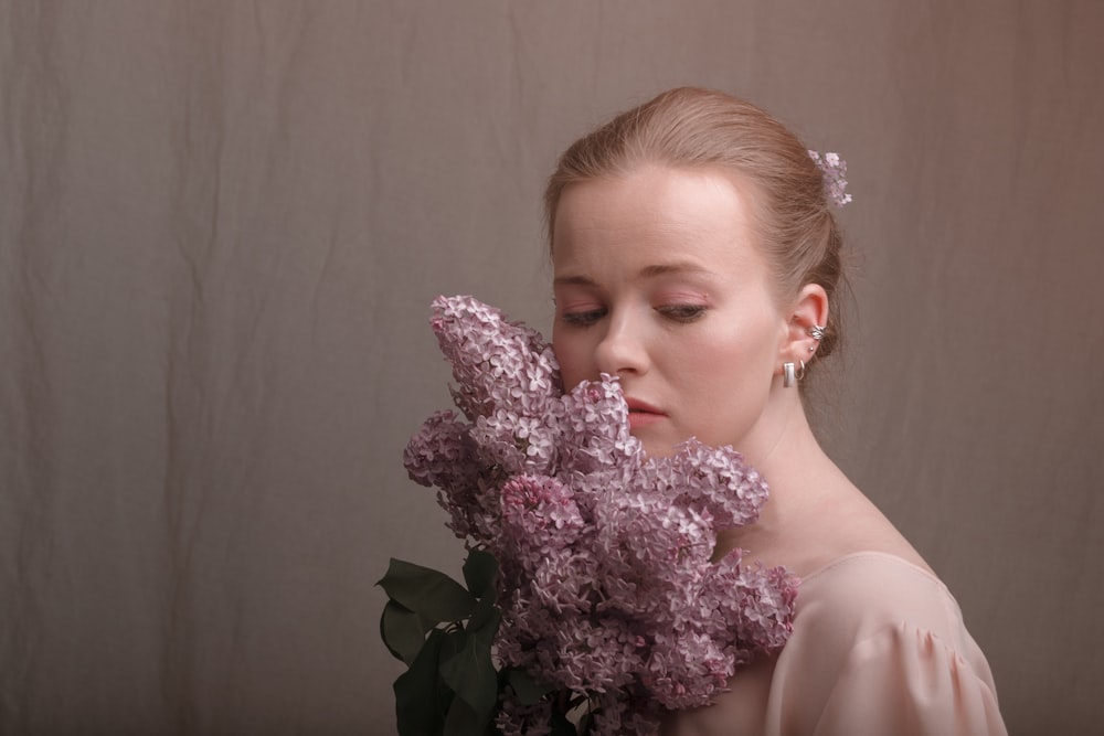 a person holding a flower