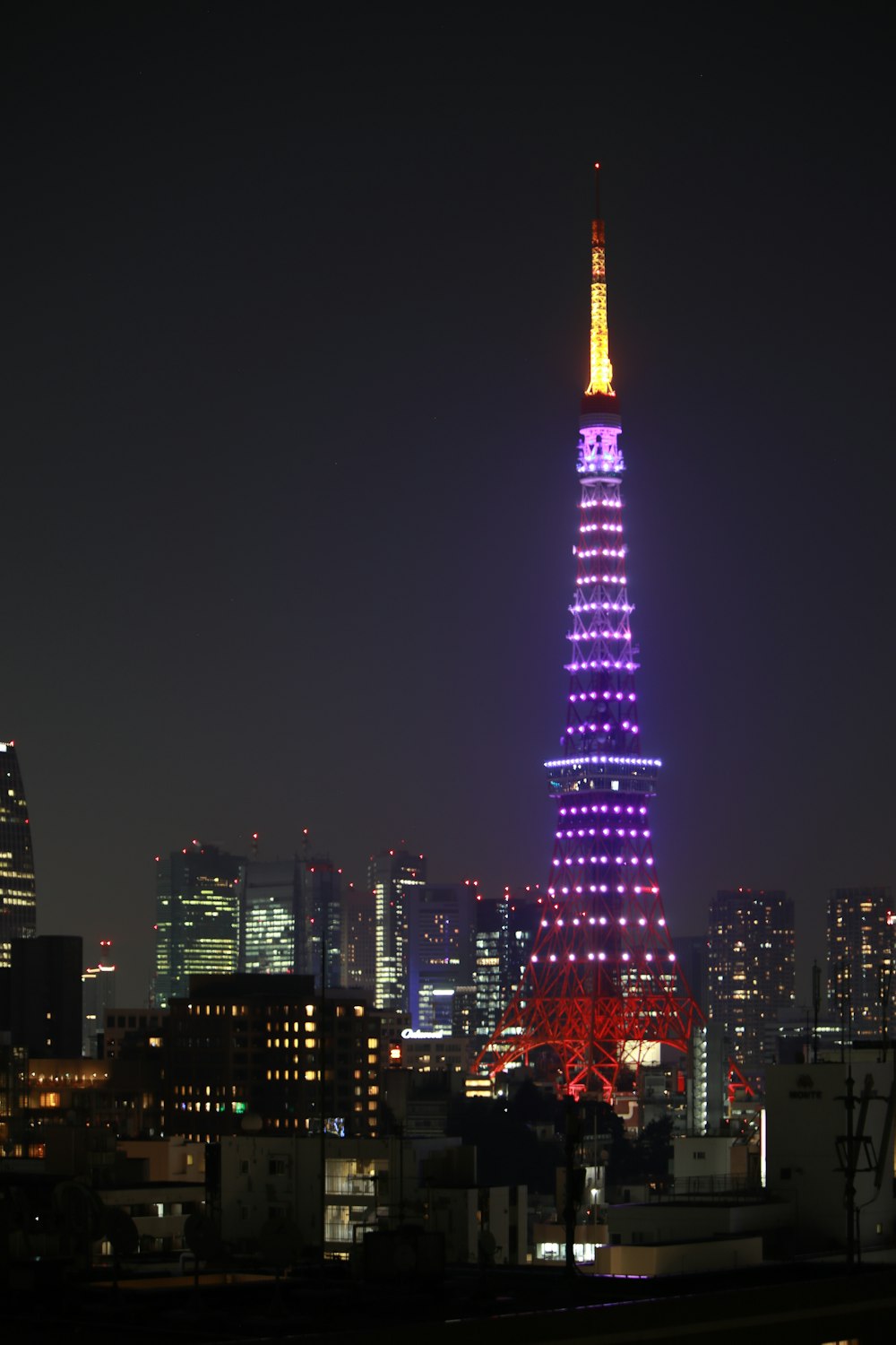 a tall tower lit up at night