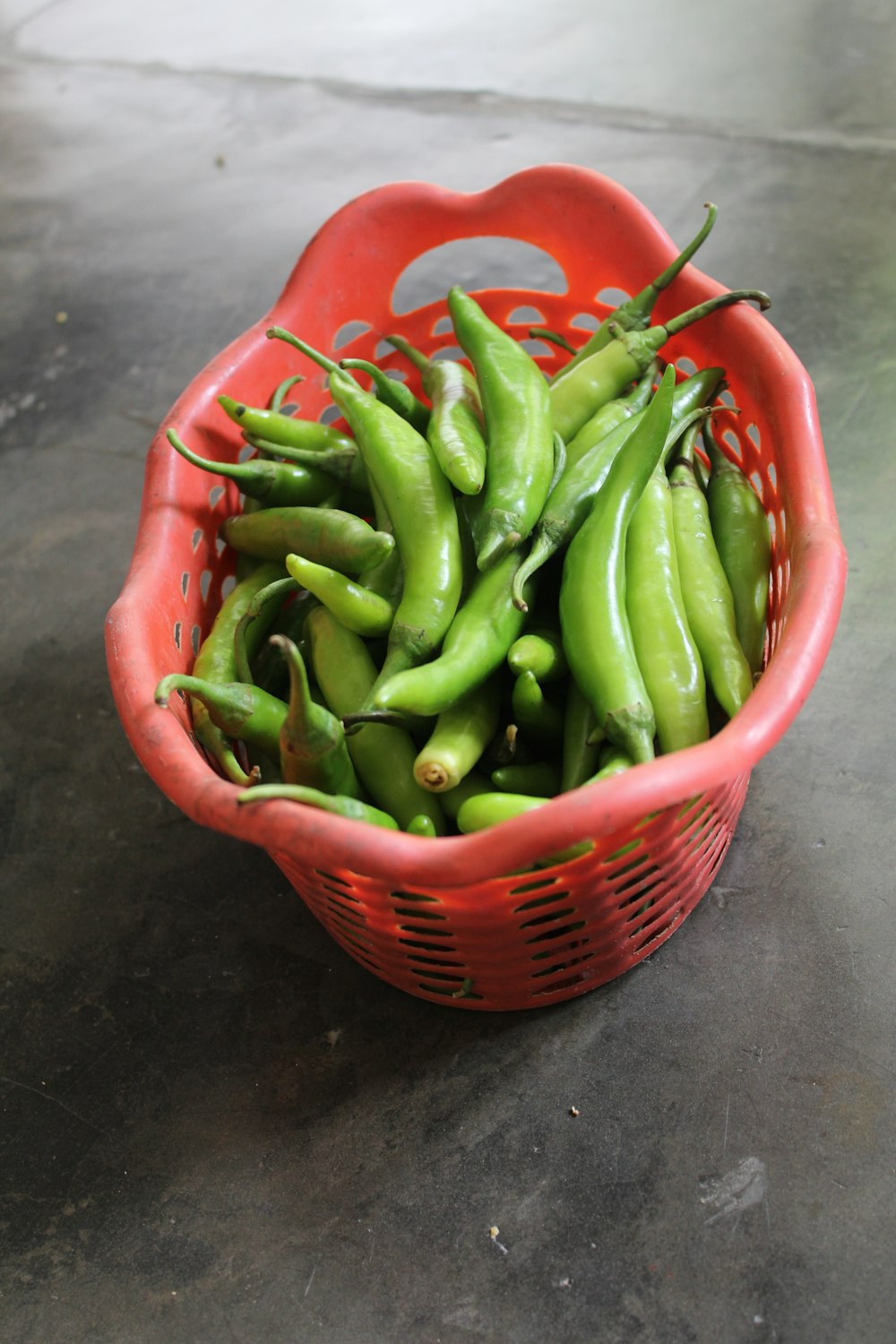 a bowl of green peppers