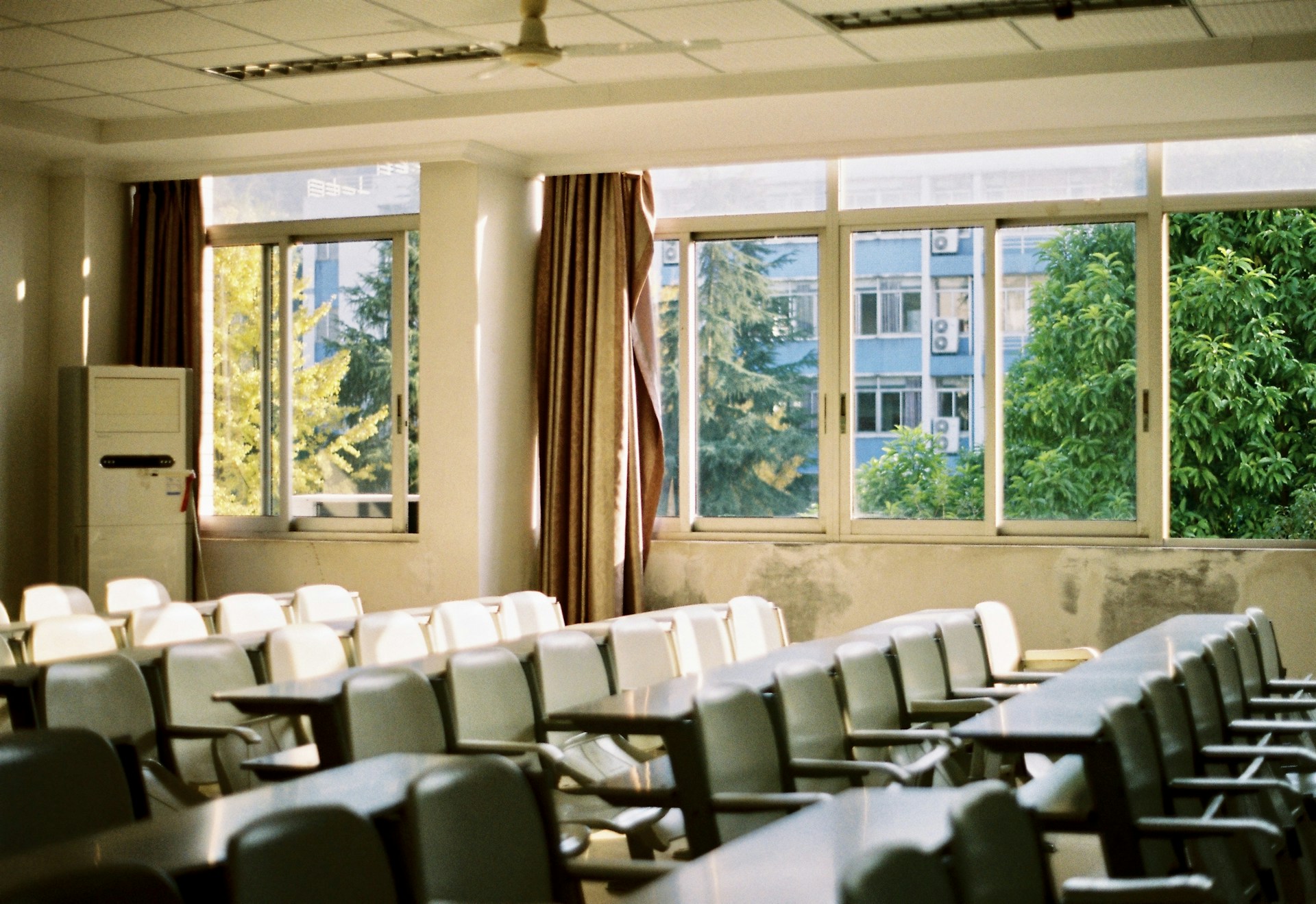 a room with tables and chairs