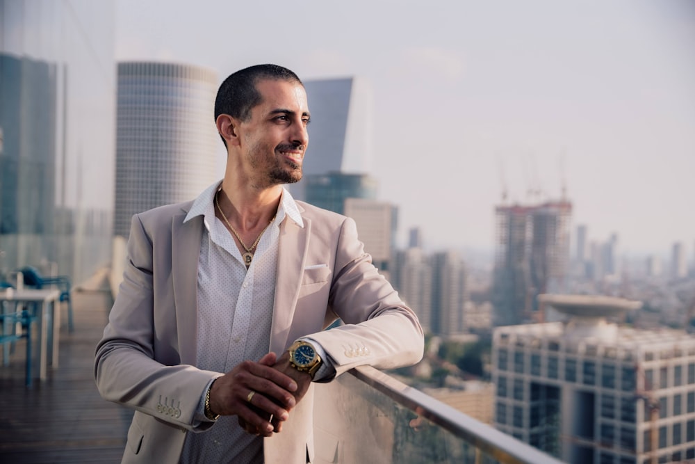 a man standing on a balcony