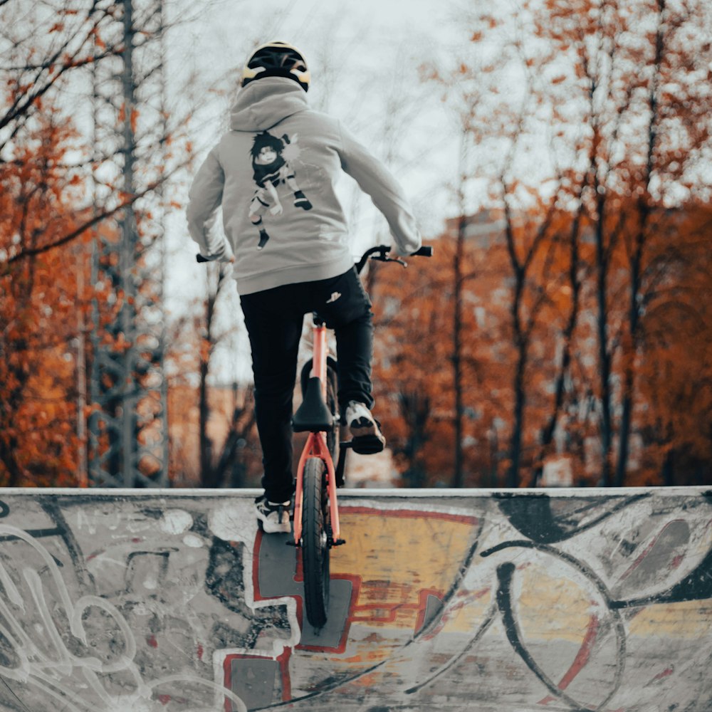 a person riding a skateboard on a ramp