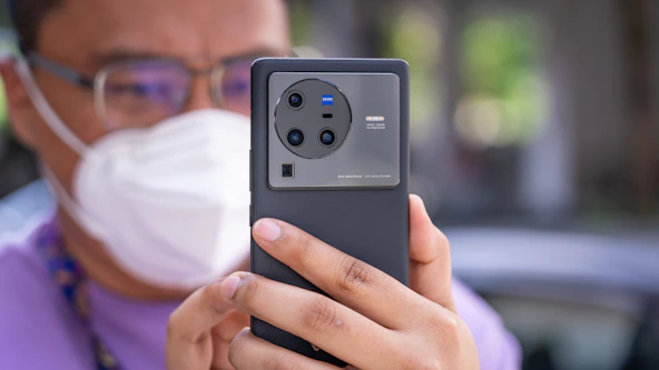 a person holding a cell phone