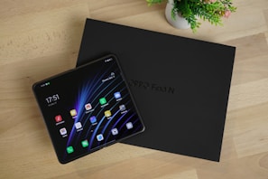 a black rectangular device with a screen