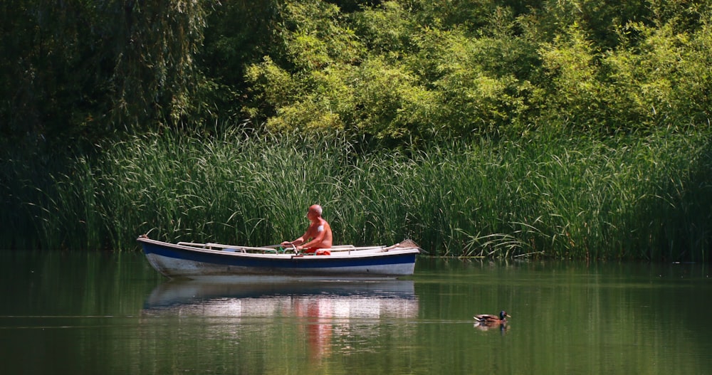 a person in a boat on a lake