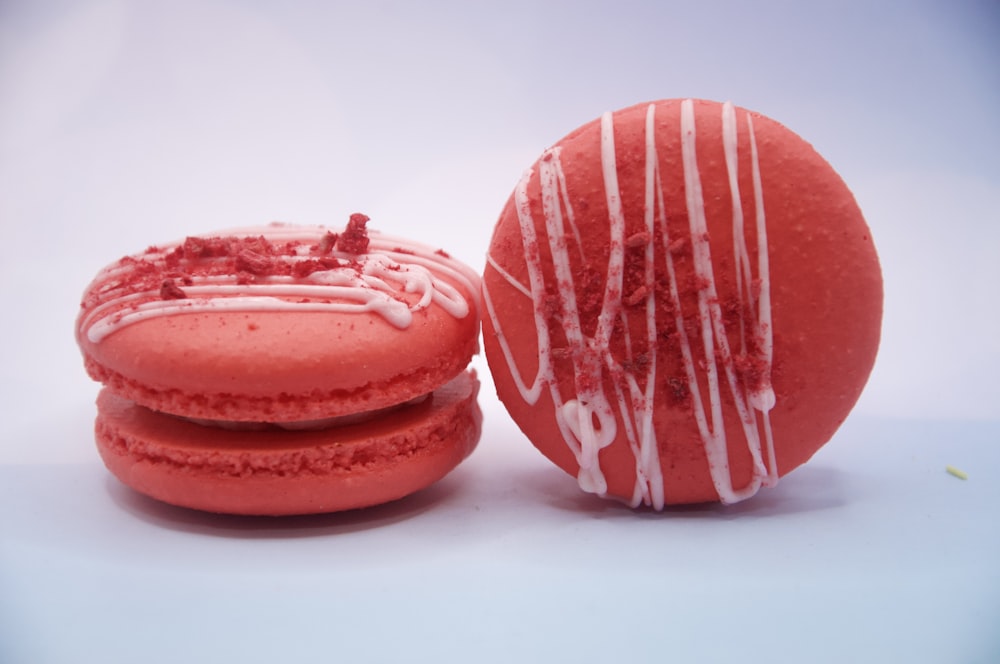 a couple of red and white macaroons