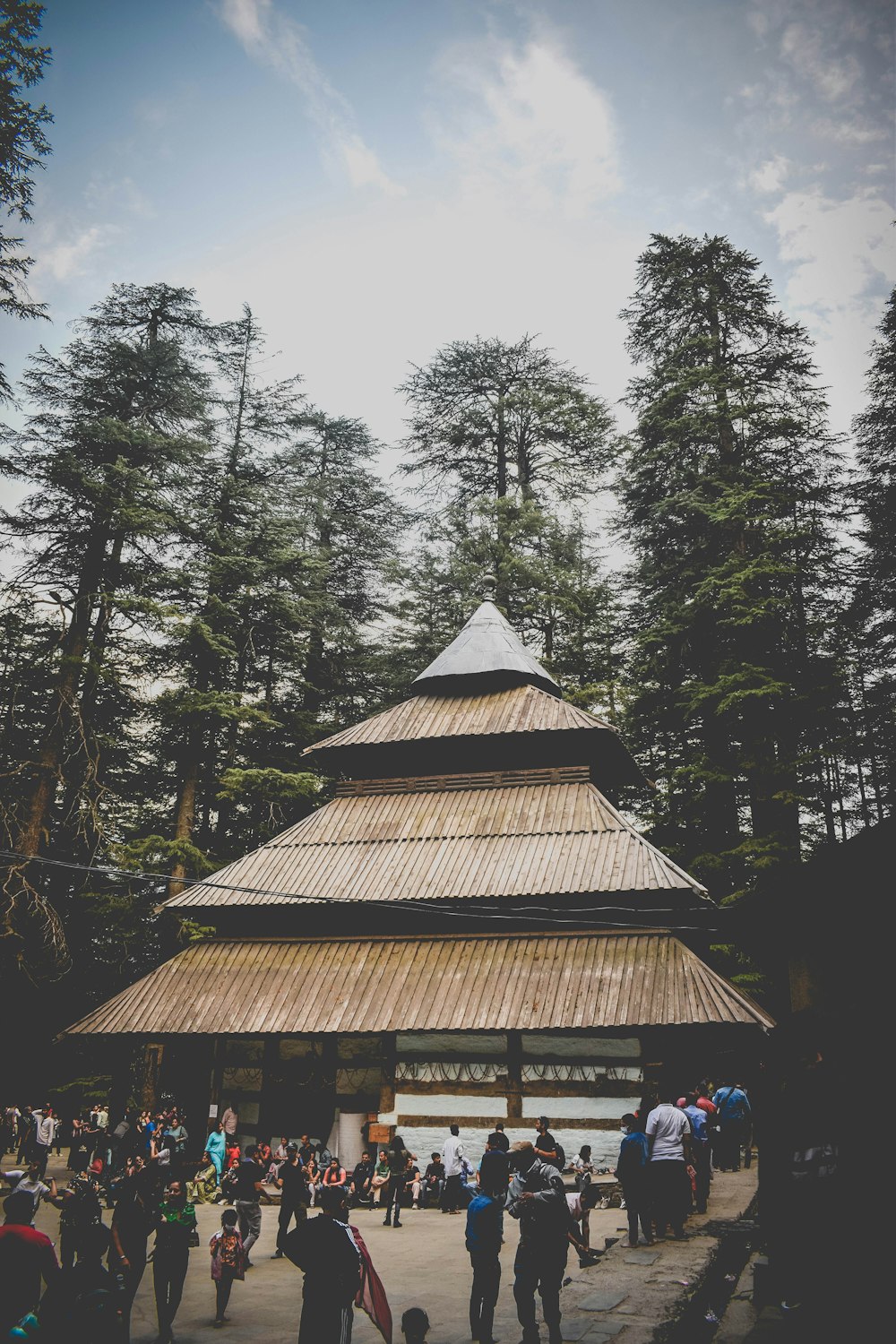 a pagoda with many people around it