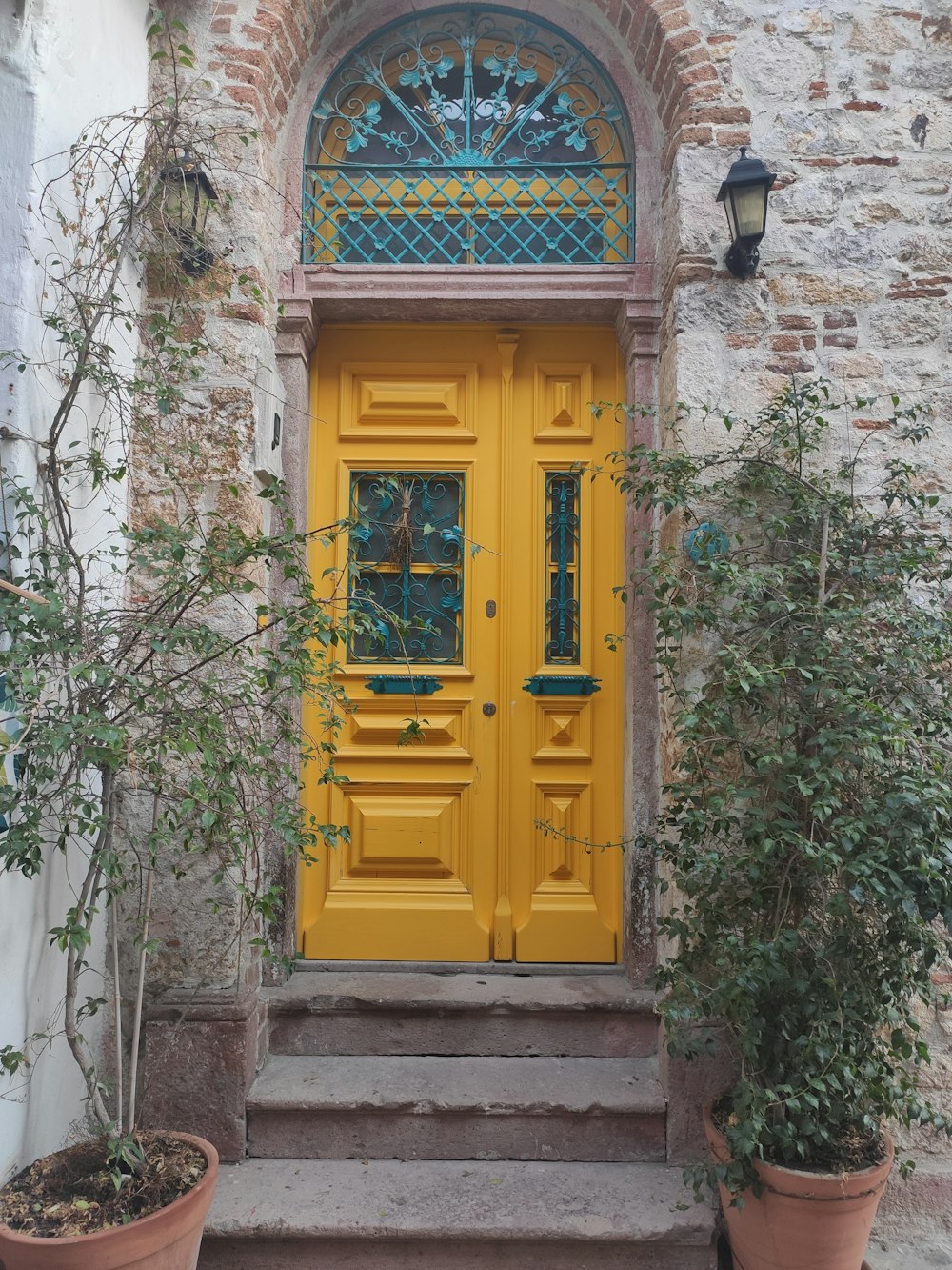 a yellow door with a window