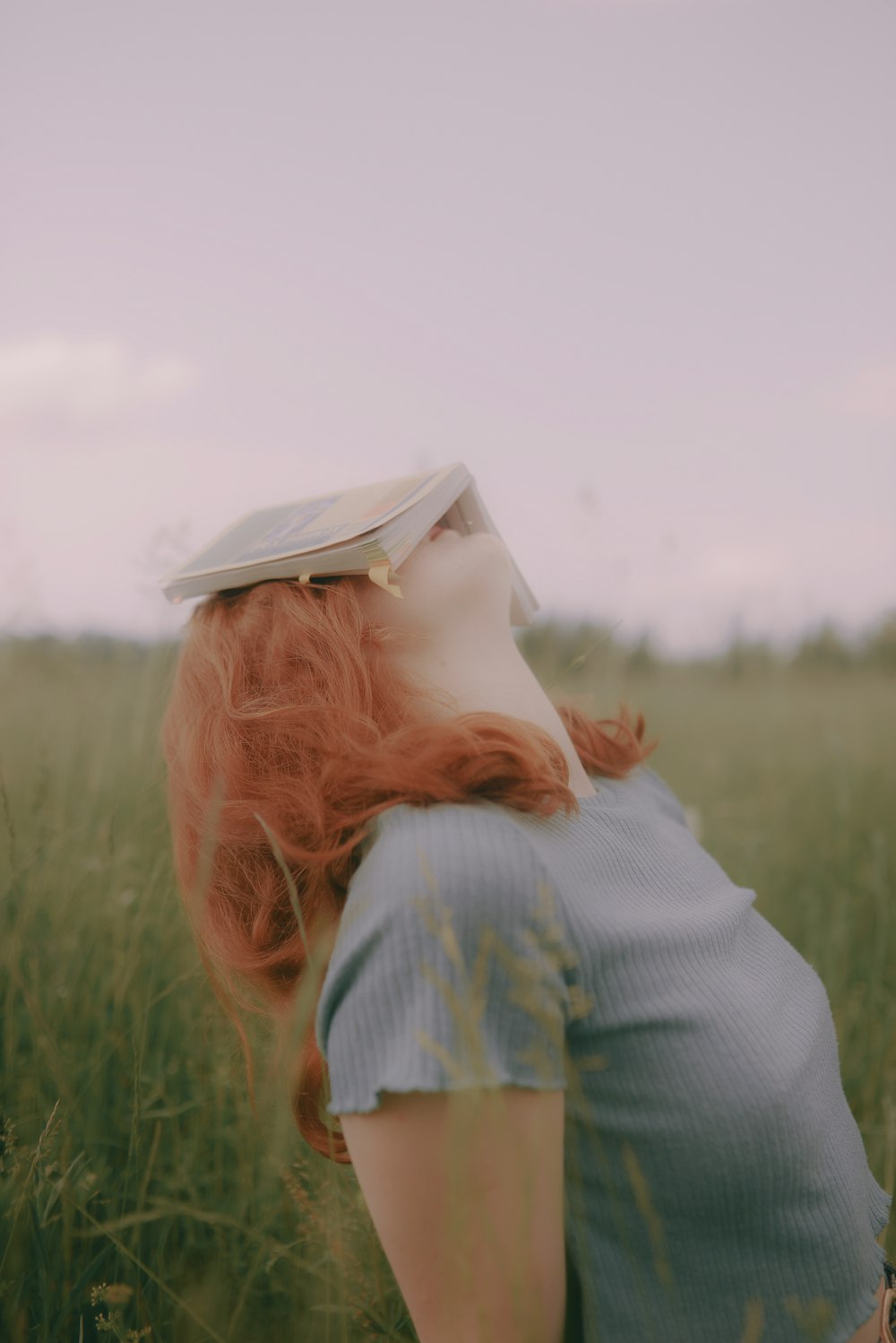 a person with a hat in a field