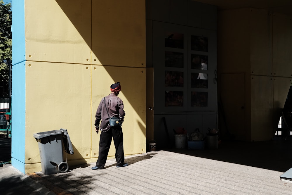 a man standing outside a building