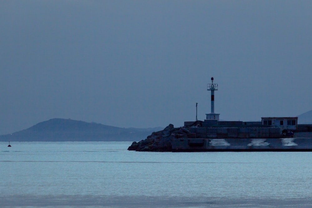 a lighthouse on a small island