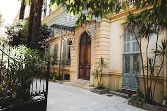 a building with trees and plants