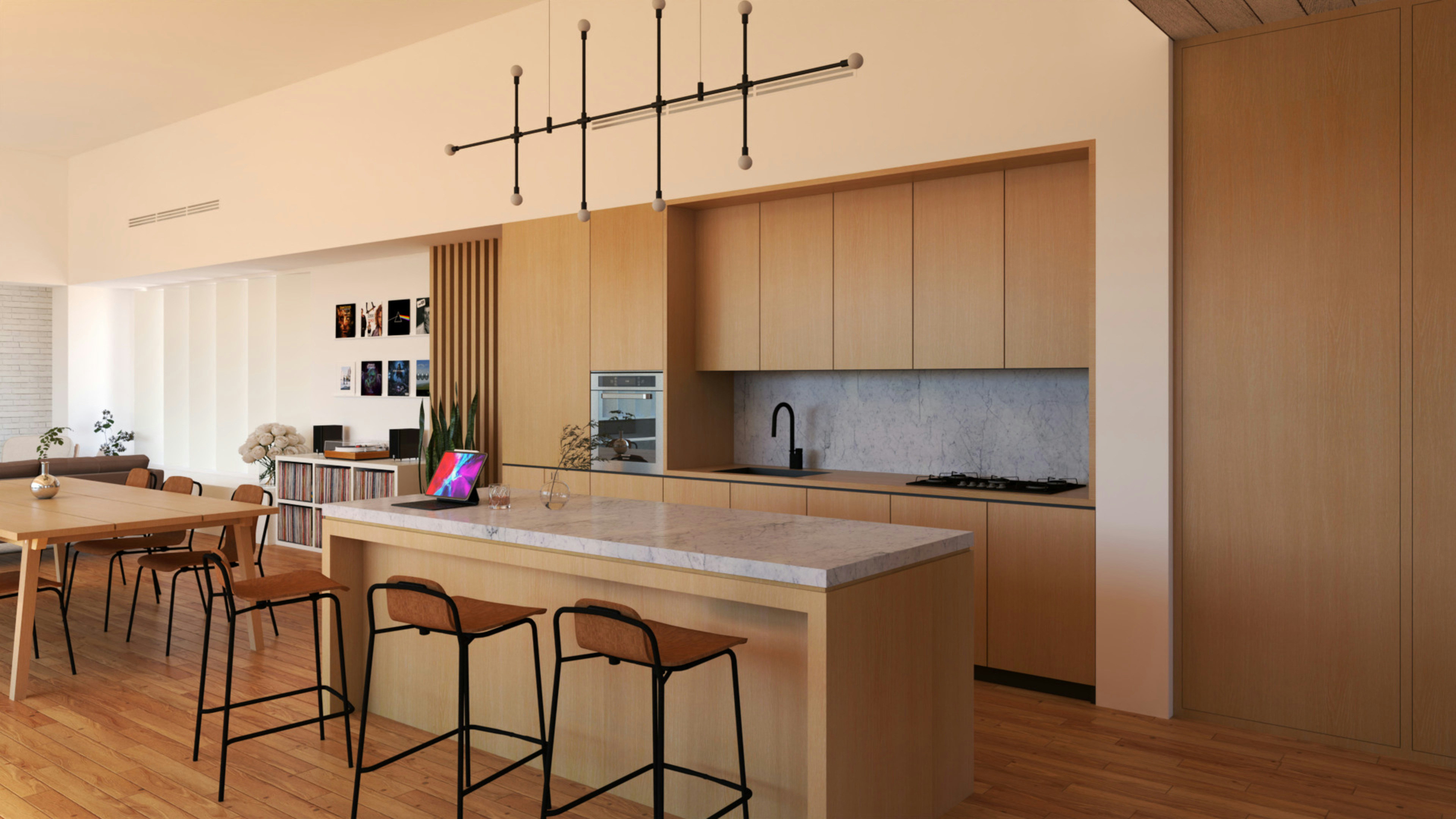 a kitchen with a bar and chairs