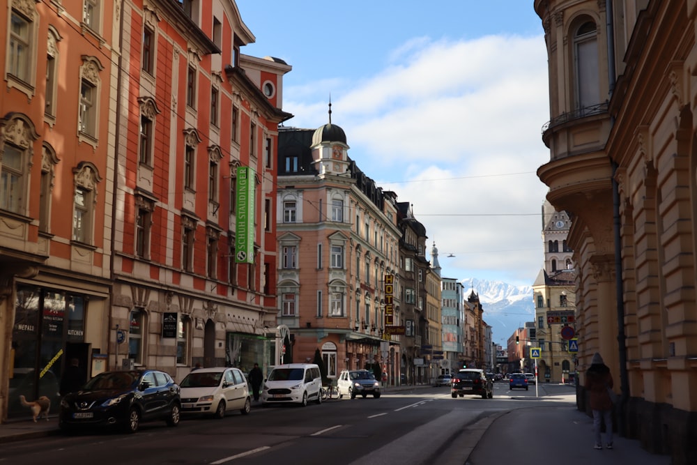 a street with cars and buildings on either side of it