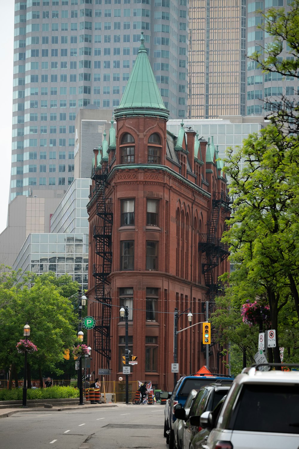 a brick building with a green roof