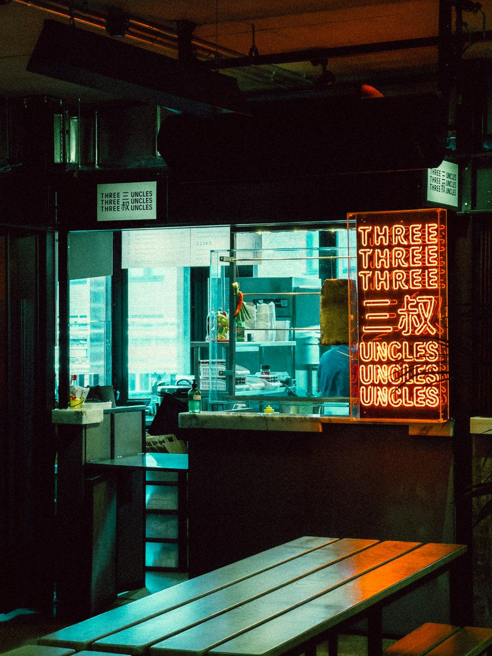 a restaurant with a sign