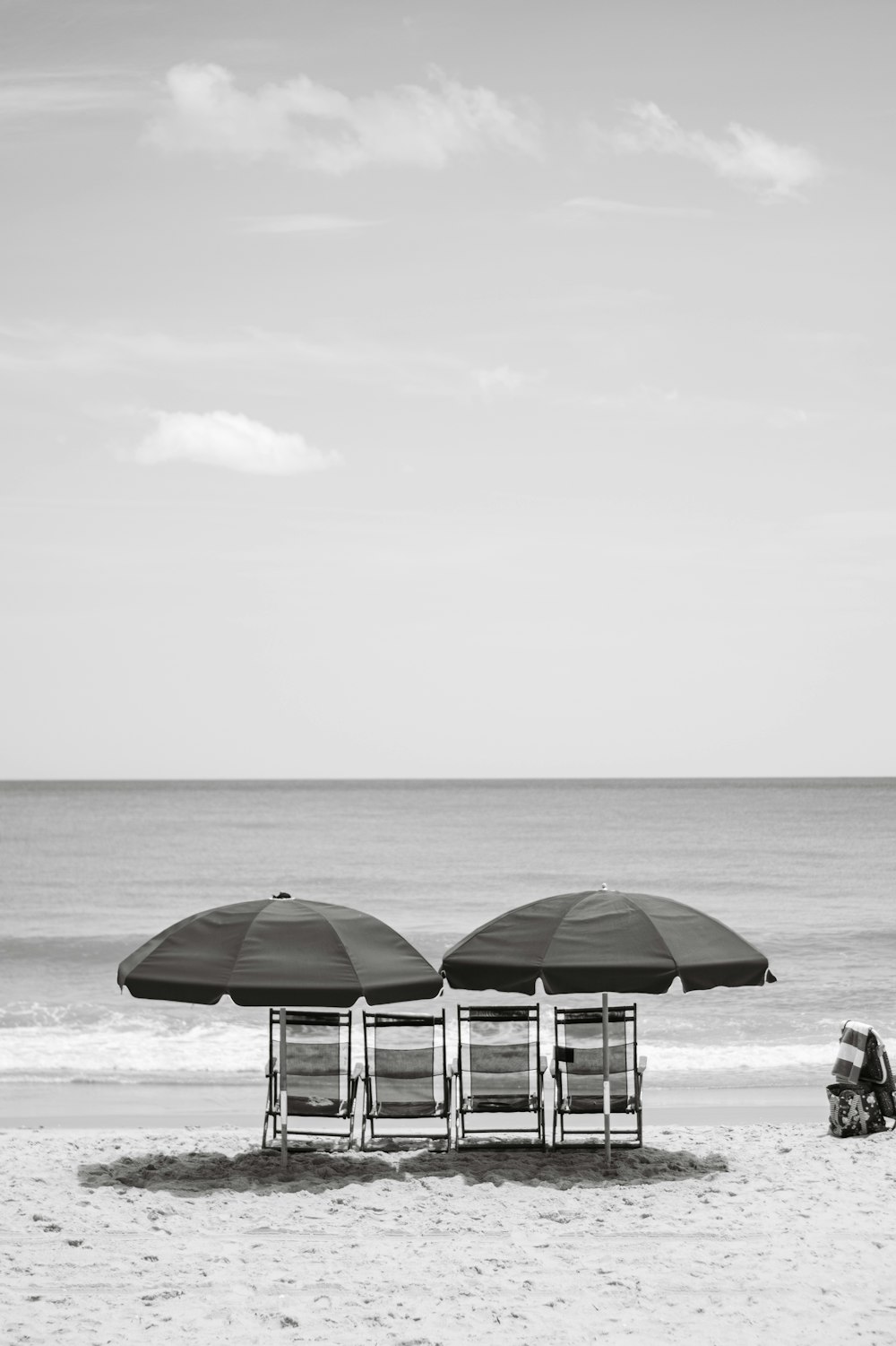 chairs and umbrellas on a beach