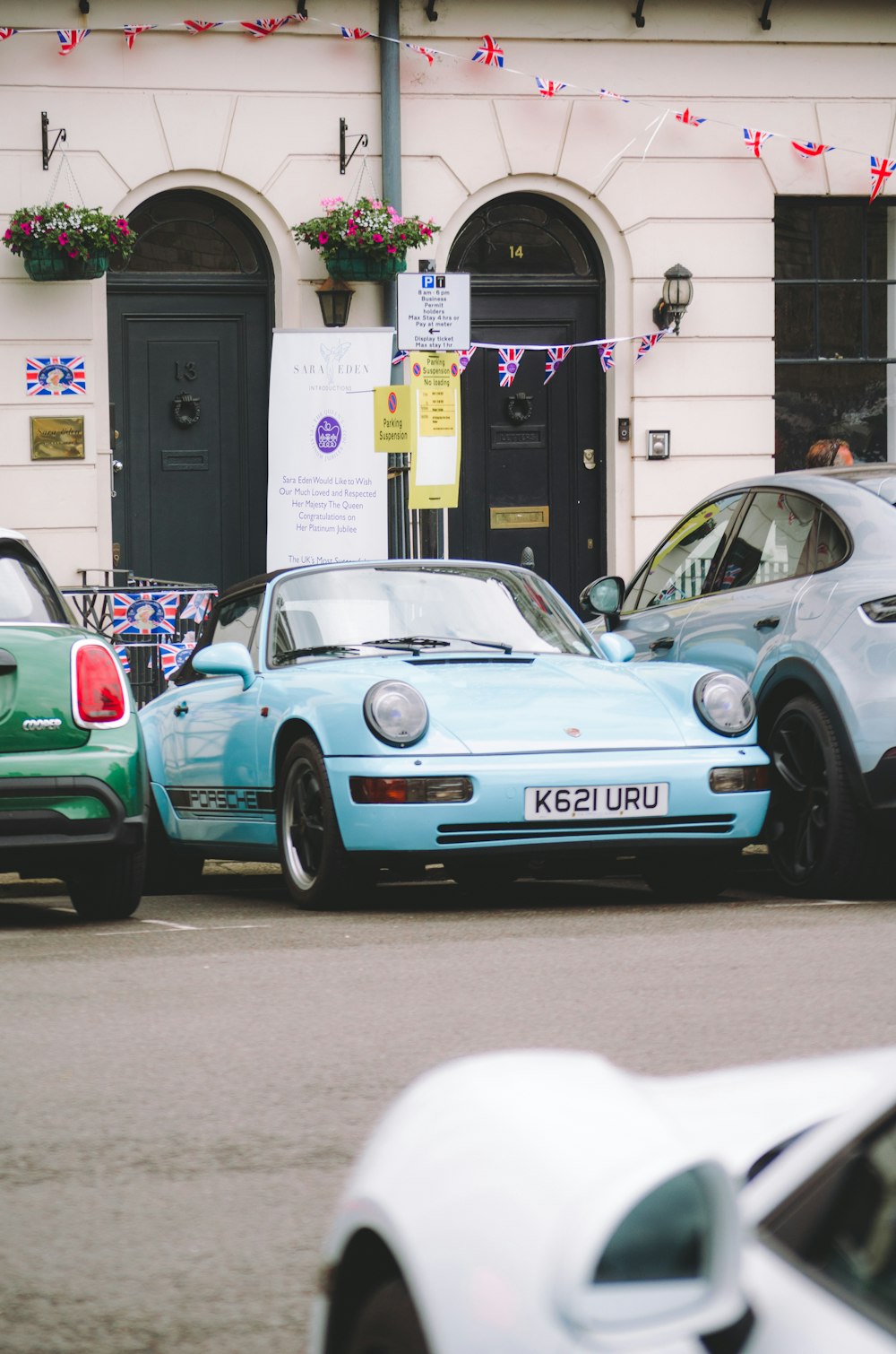 a group of cars parked outside a building