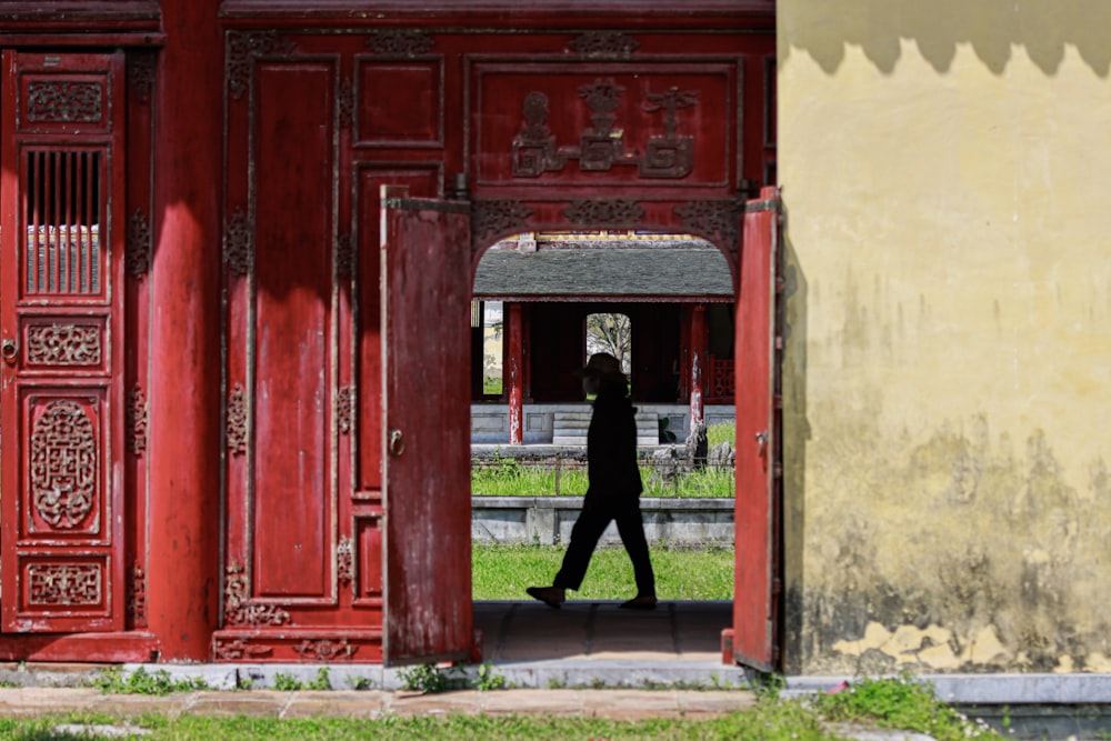 a person walking through a doorway