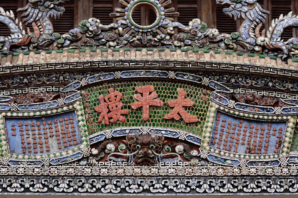 Hue October — ornate carved and painted doorway inside the Imperial Citadel
