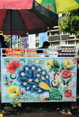 A vibrant stall design sketch featuring bold colors and creative layout ideas.