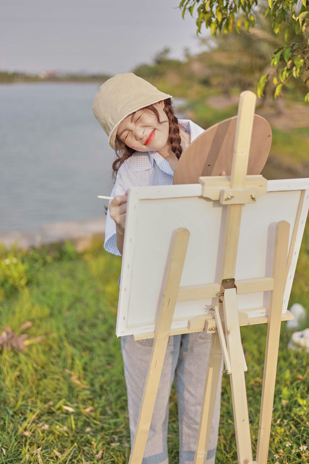 a girl painting a picture