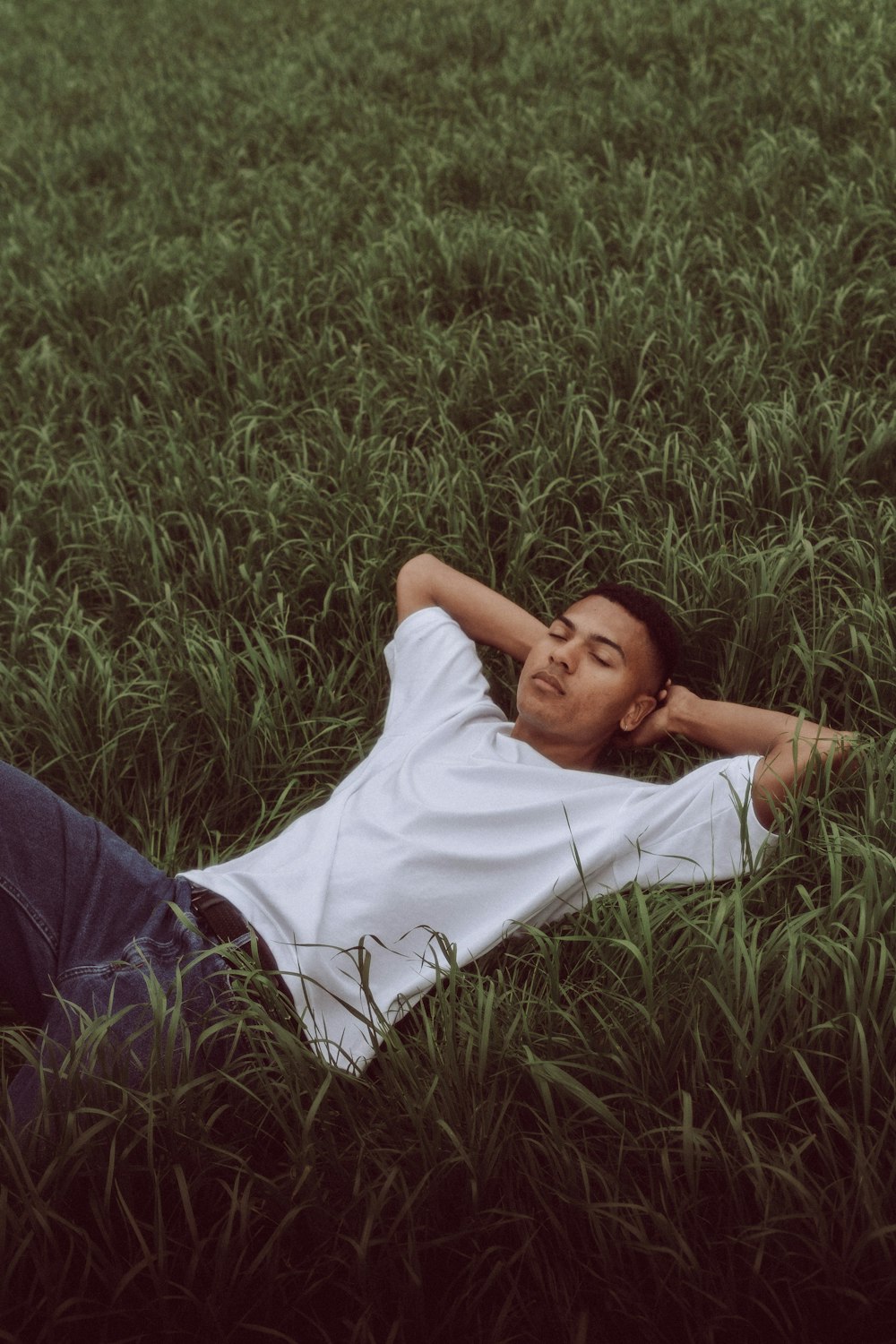 a person lying in the grass