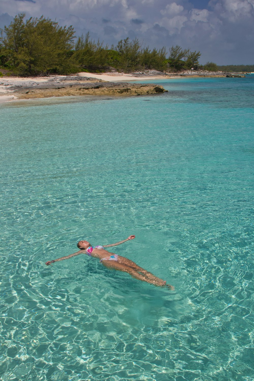 a person swimming in a body of water