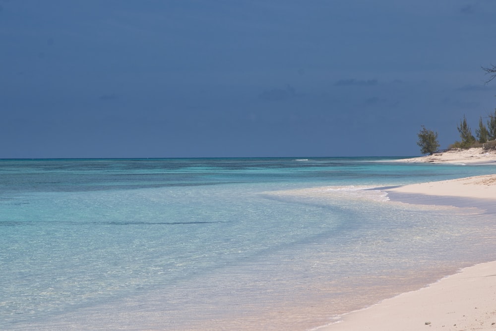 a beach with blue water