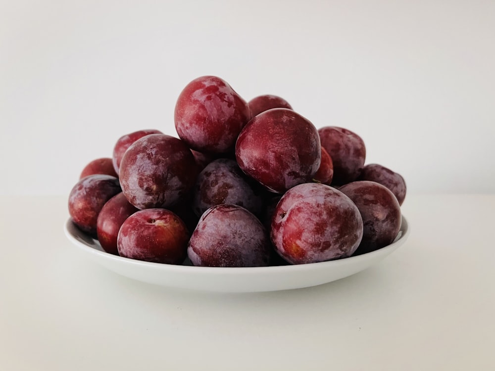 a bowl of red cherries