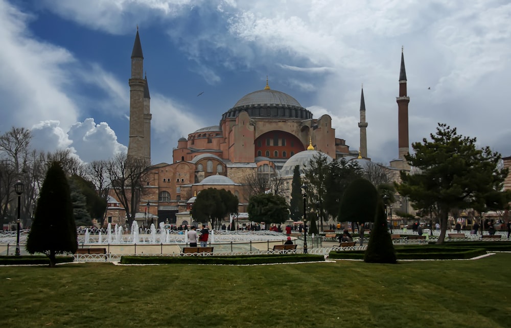 a large building with towers and domes with Hagia Sophia in the background