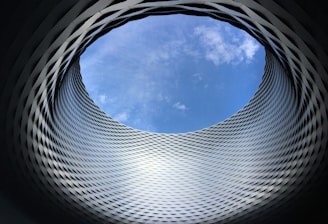 a circular object with a blue sky