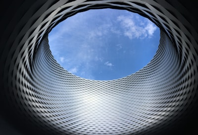 a circular object with a blue sky