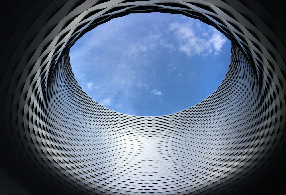 a circular object with a blue sky