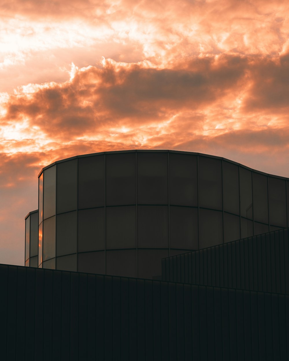 a building with a cloudy sky