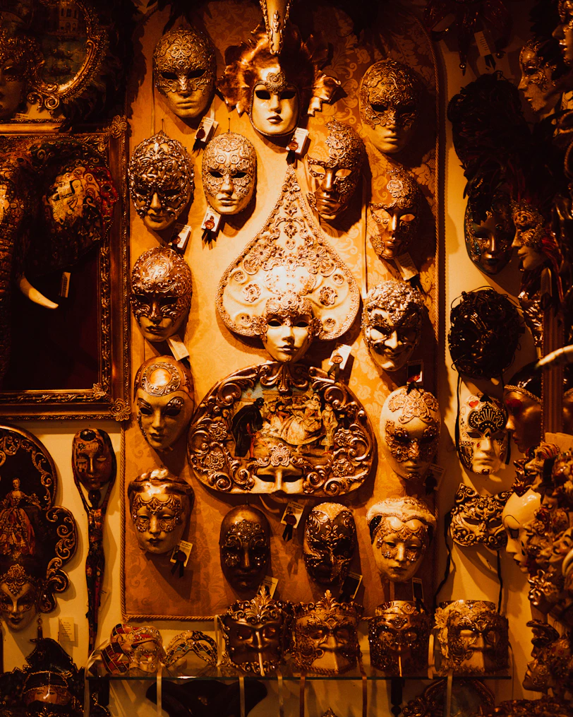 a wall full of antique clocks