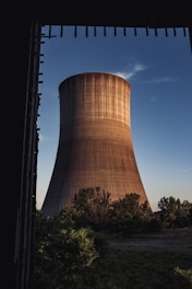 a tall building with trees in front of it