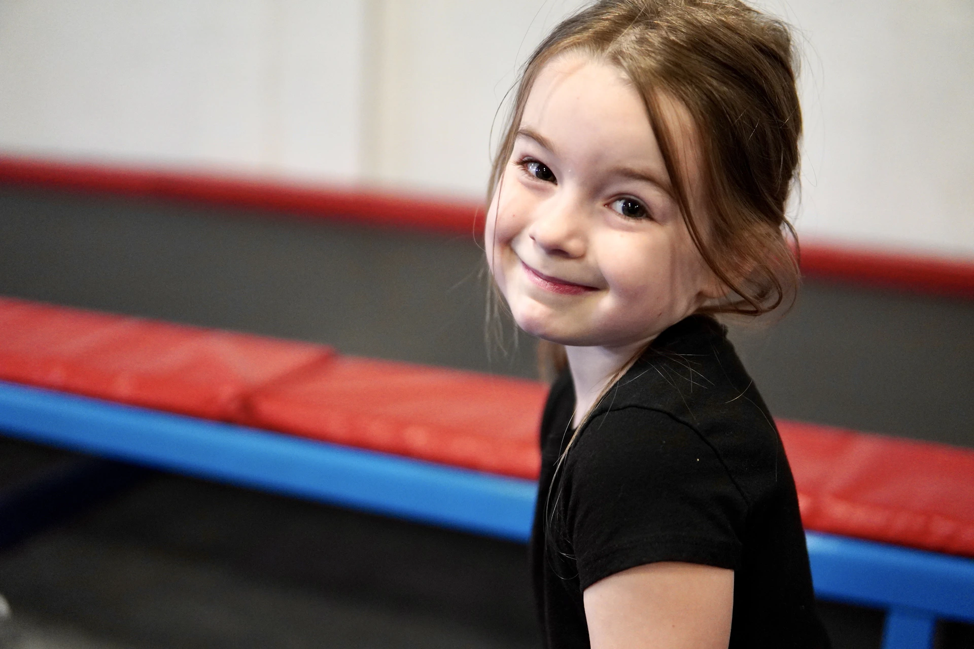 a person smiling for the camera